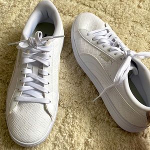 White Puma Sneakers in a size women’s 9